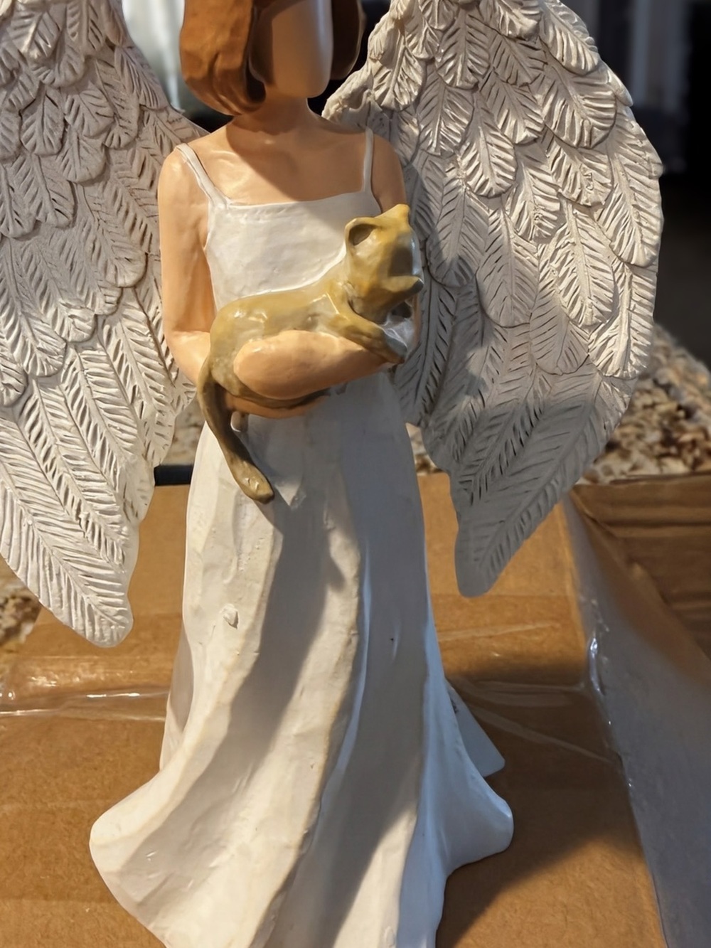 White Angel Figurine Holding a Small Animal - Decorative Statue